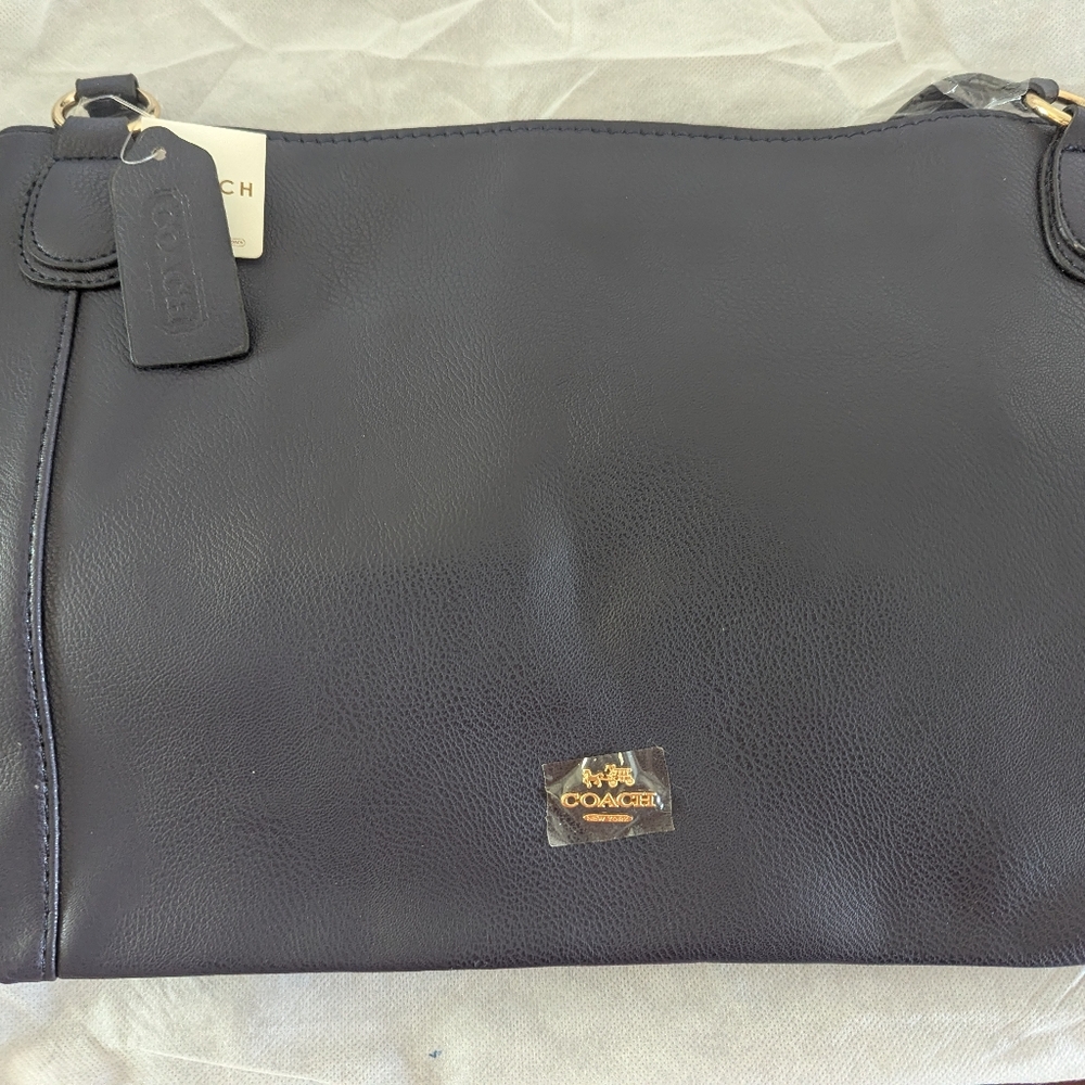 Coach Black Leather Messenger Bag with Classic Styling